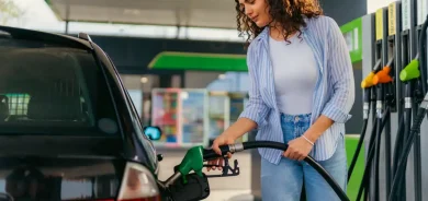 girl at the gas station filling her car